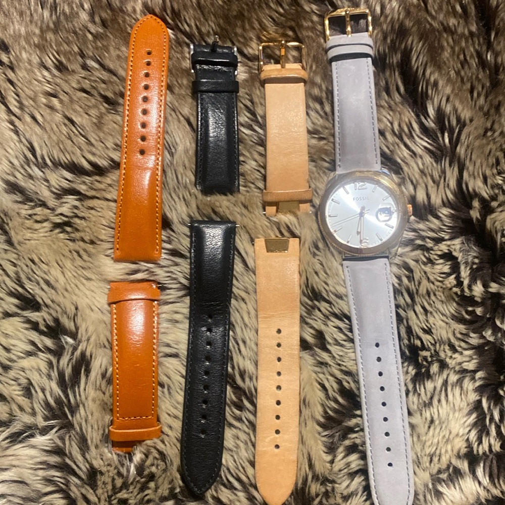 Fossil Watch and 4 bands. All bands are Fossil.